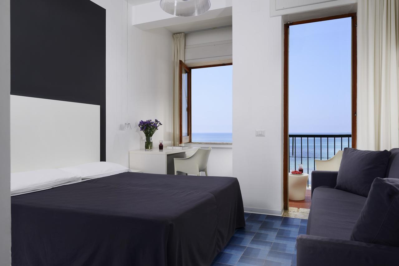 Standard Triple Room Sea View,696811482:JPEG