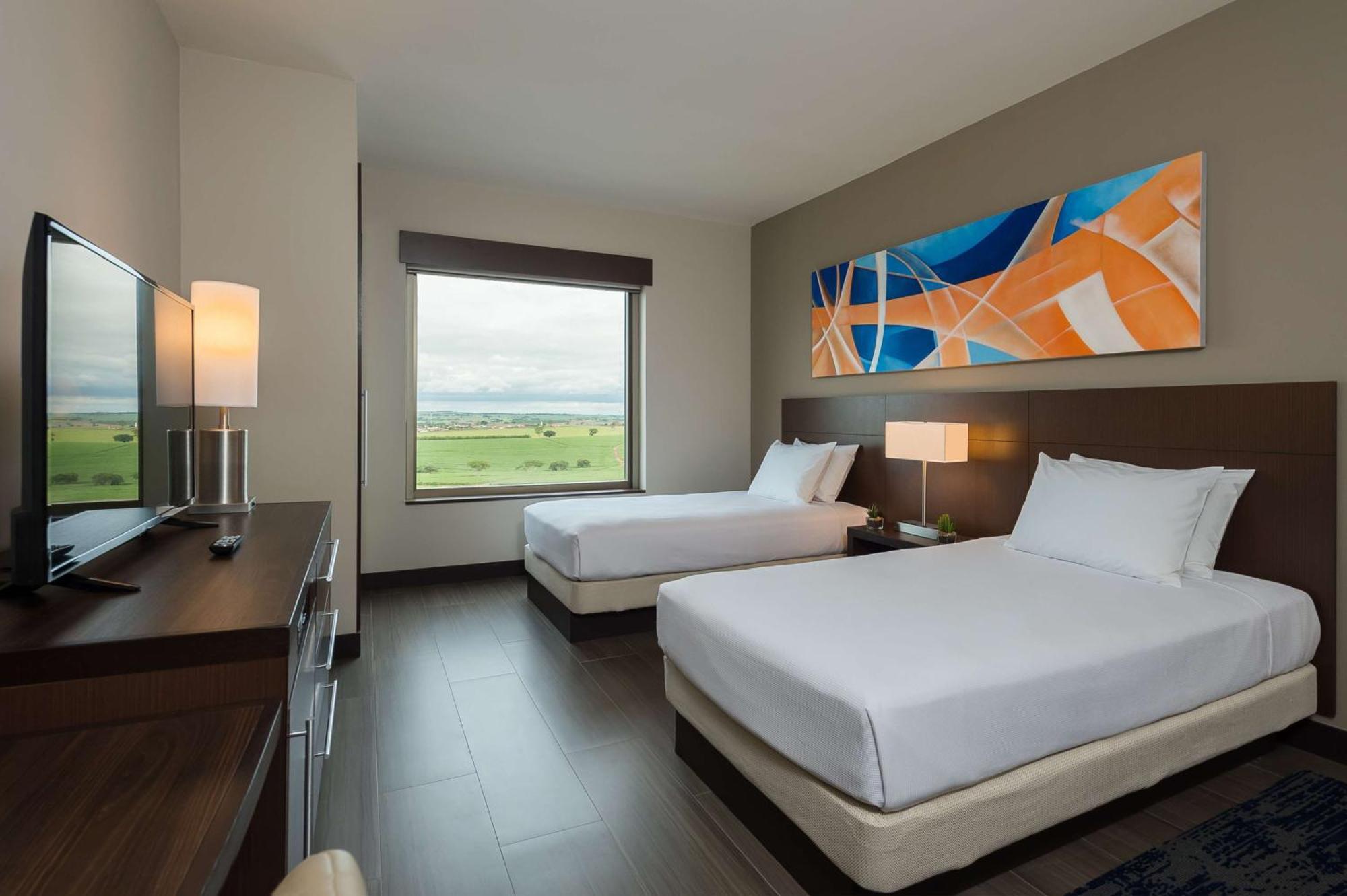 Quarto com 2 Camas de Solteiro e Vista