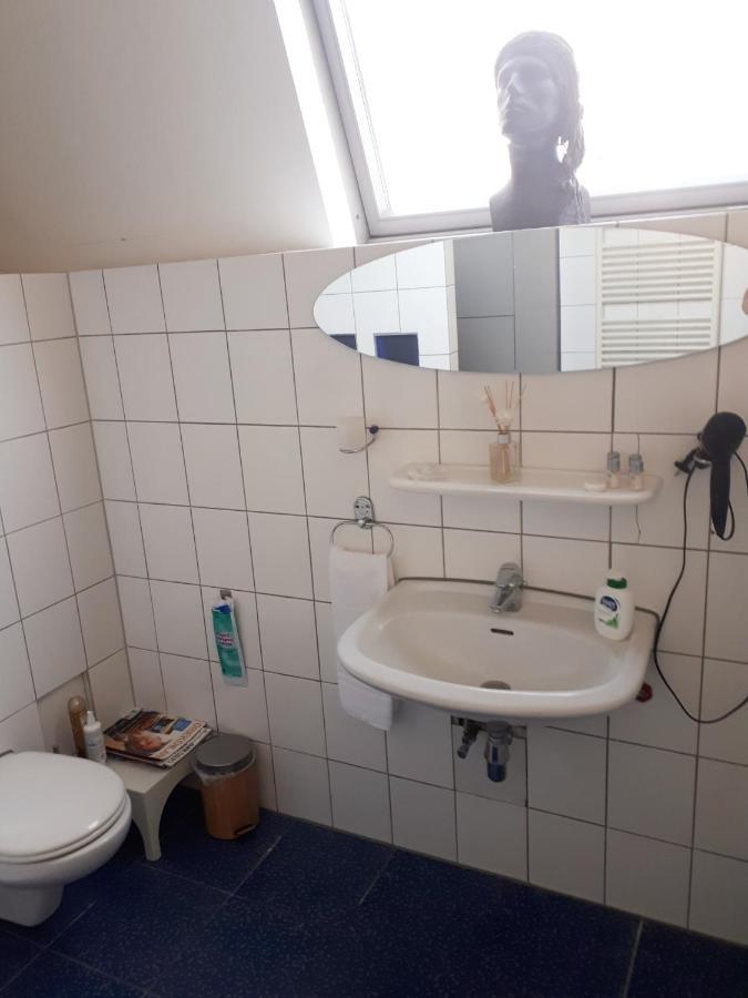 Single Room Shared Shower Toilet