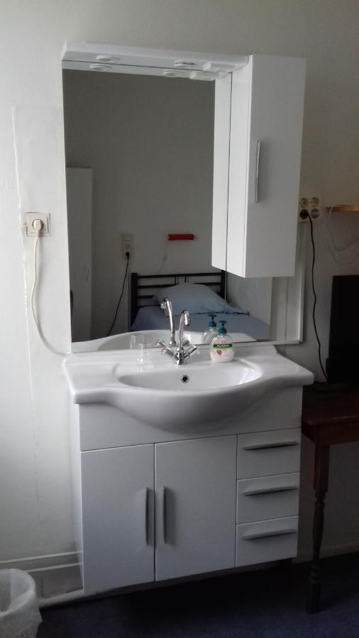 Single Room Shared Shower Toilet