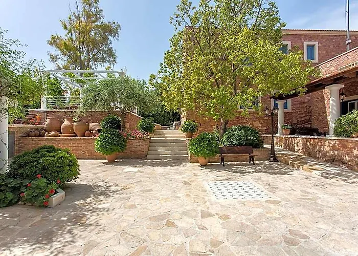Dine On The Generous Veranda At A Rustic Stone Getaway