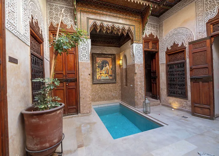 Riad Le J